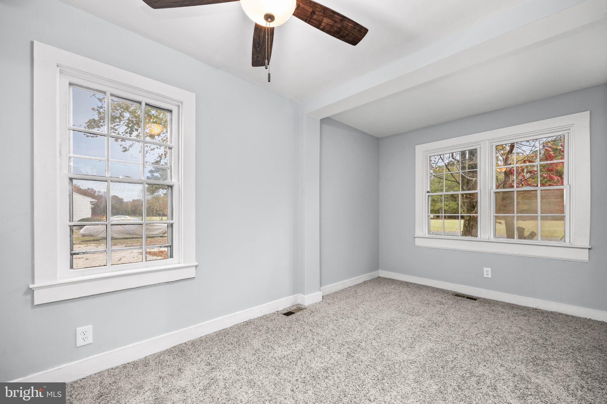 28766 Larry Lankford Road Princess Anne, MD 21853 - Photo 19 of 38 a view of an empty room with a window