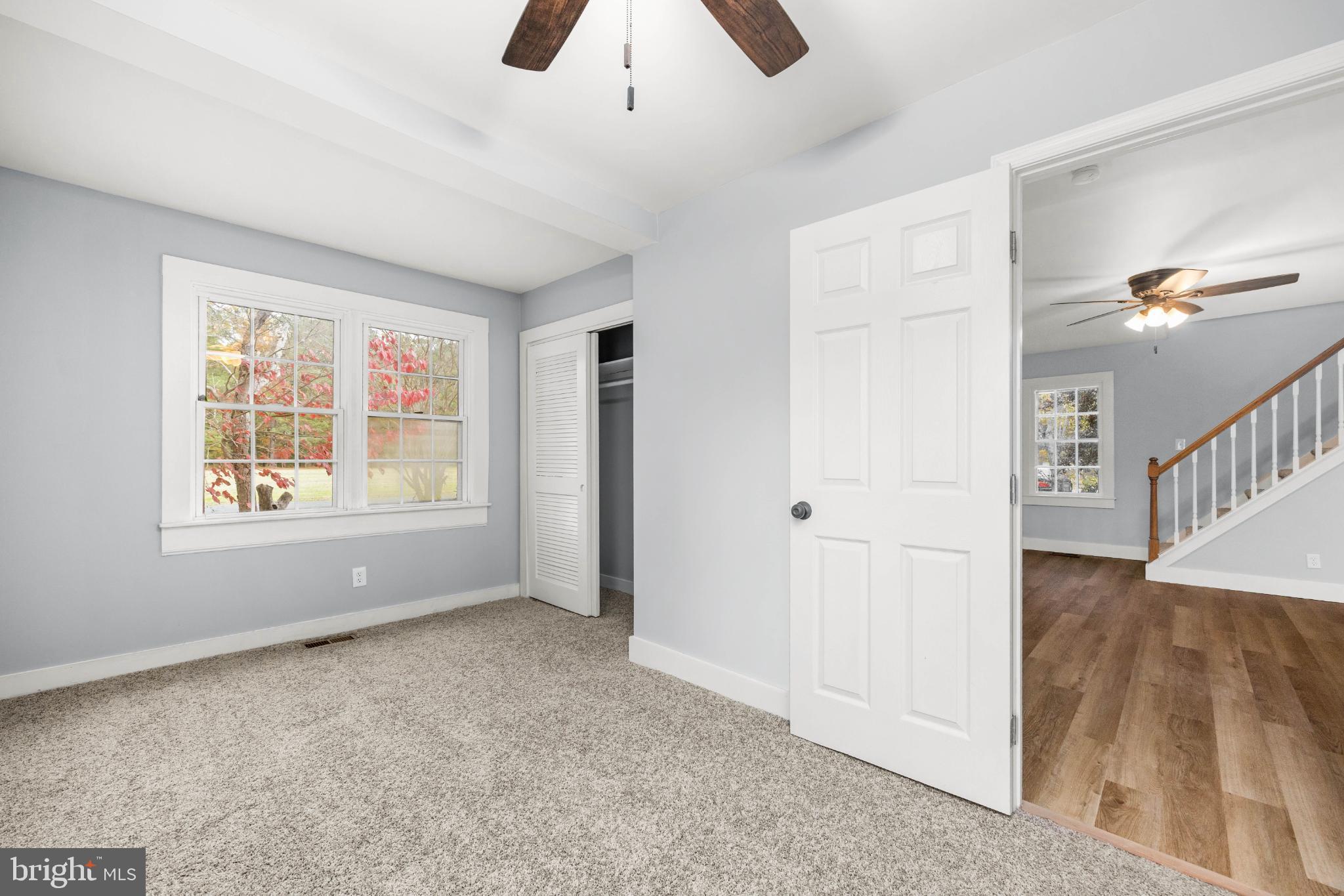 28766 Larry Lankford Road Princess Anne, MD 21853 - Photo 20 of 38 wooden floor in an empty room with a window