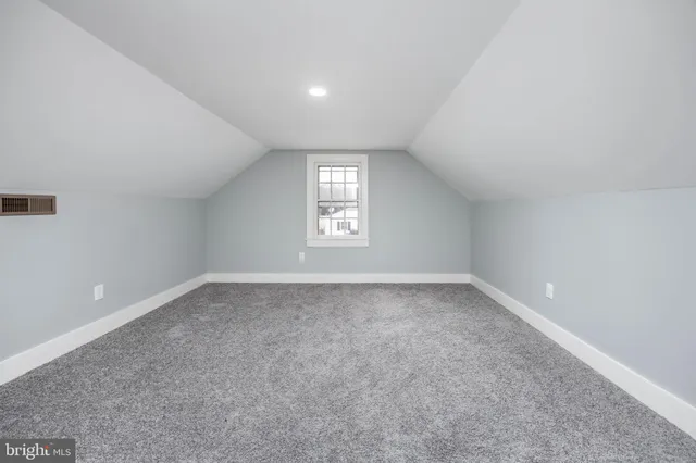 a view of a window in an empty room