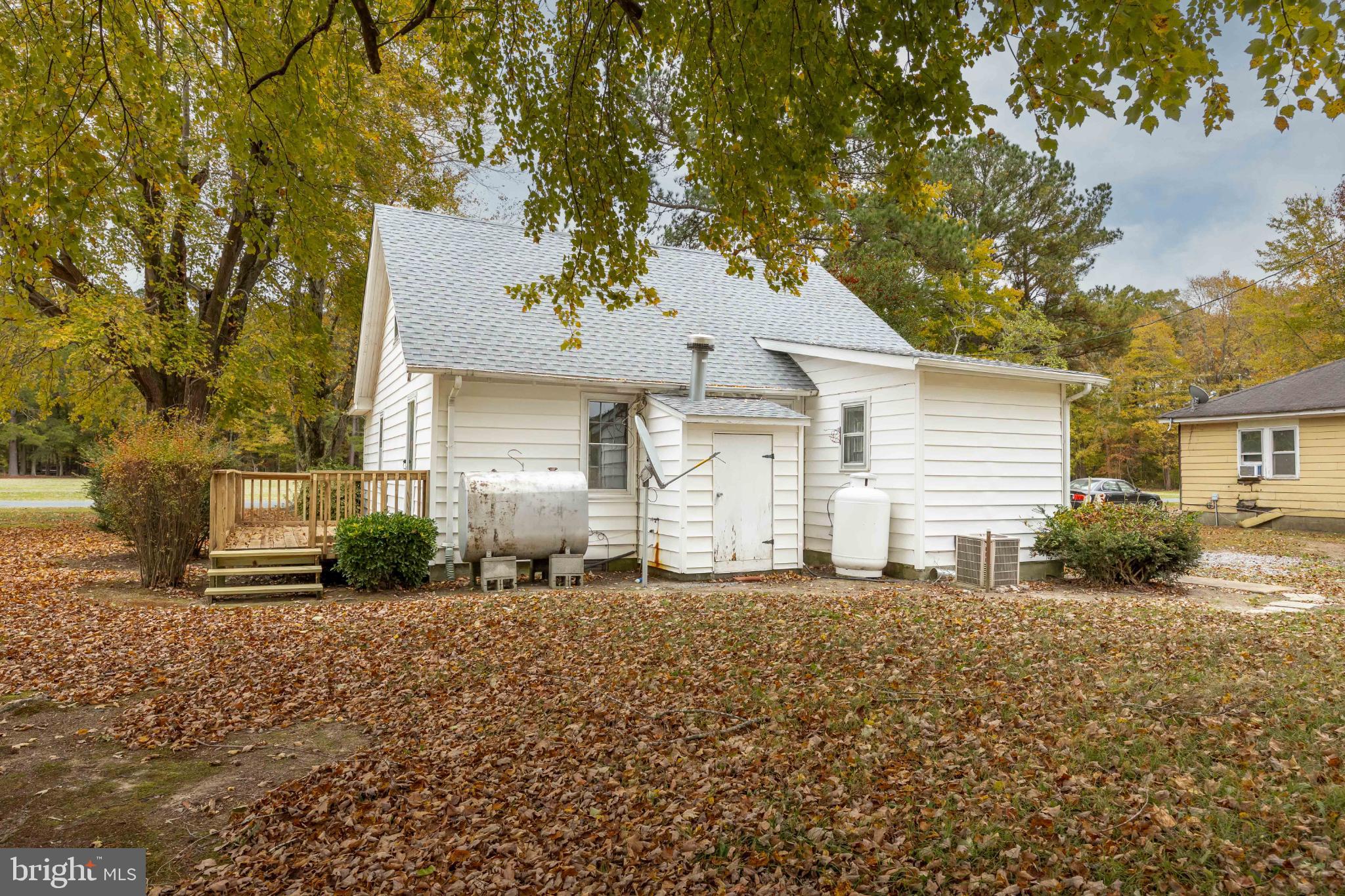 28766 Larry Lankford Road Princess Anne, MD 21853 - Photo 29 of 38 a front view of a house with a yard