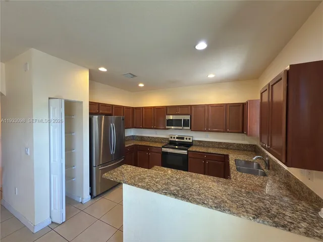 a bathroom with a glass door shower