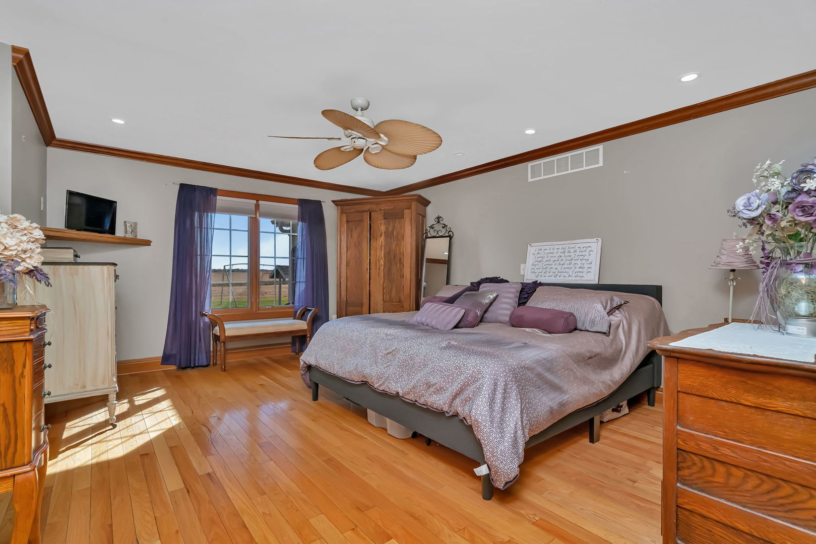 2624 East 21st Road Marseilles, IL 61341 - Photo 27 of 74 a bedroom with a bed and a flat screen tv