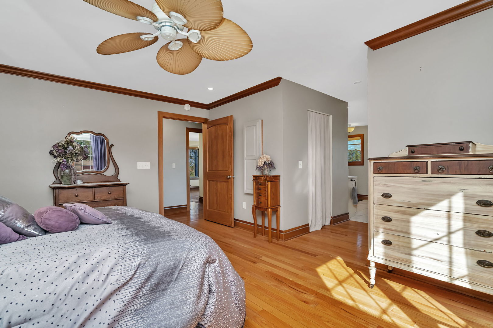 2624 East 21st Road Marseilles, IL 61341 - Photo 28 of 74 a bedroom with a bed and a chandelier