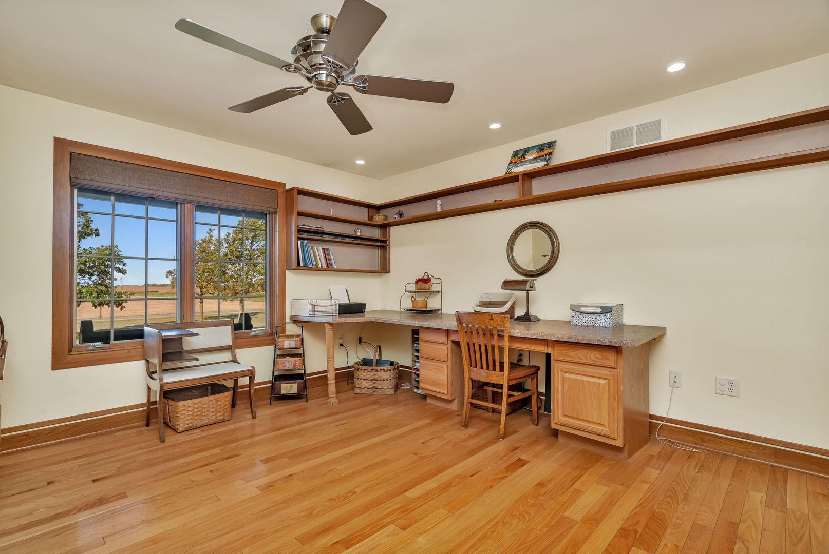 2624 East 21st Road Marseilles, IL 61341 - Photo 33 of 74 a view of a work space with wooden floor and a ceiling fan