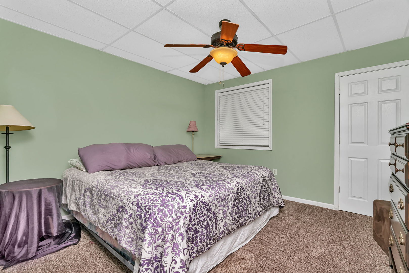 2624 East 21st Road Marseilles, IL 61341 - Photo 38 of 74 a bedroom with a bed and a chandelier