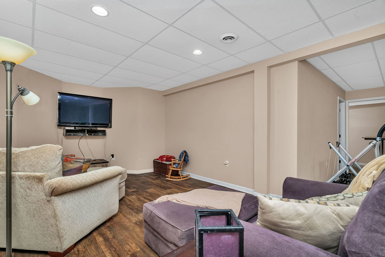 2624 East 21st Road Marseilles, IL 61341 - Photo 41 of 74 a living room with furniture a flat screen tv and a window