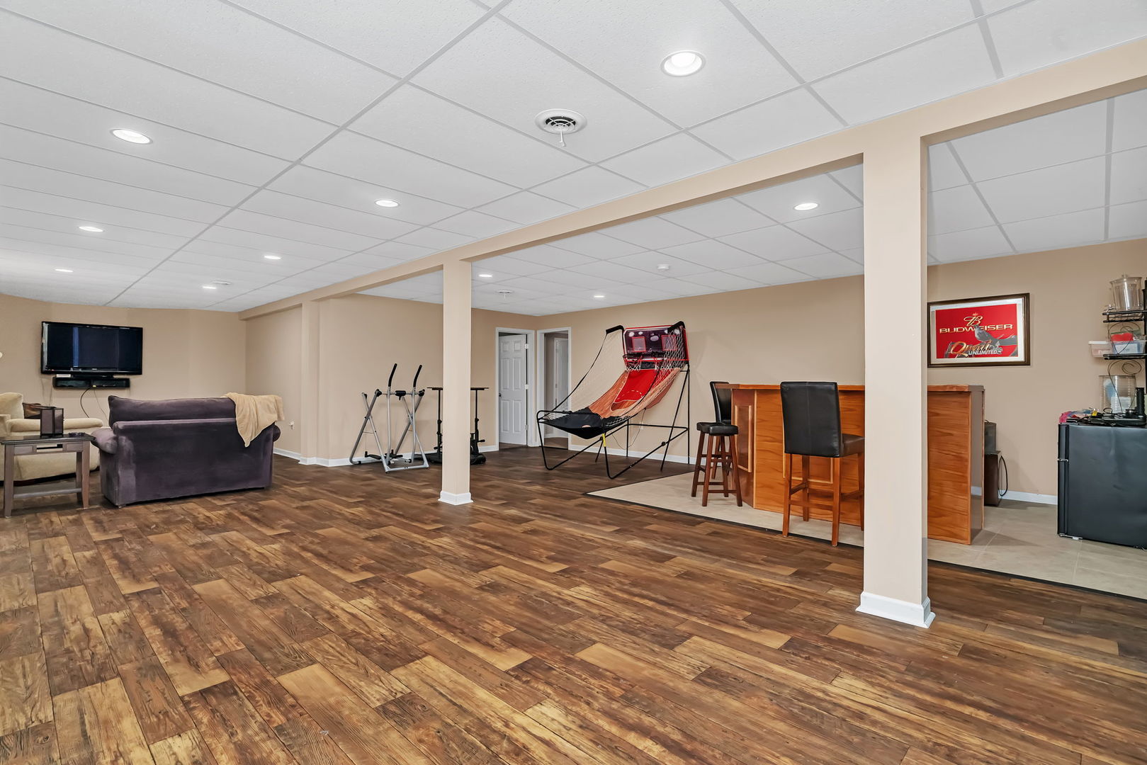 2624 East 21st Road Marseilles, IL 61341 - Photo 42 of 74 a view of a room with gym equipment and a flat screen tv