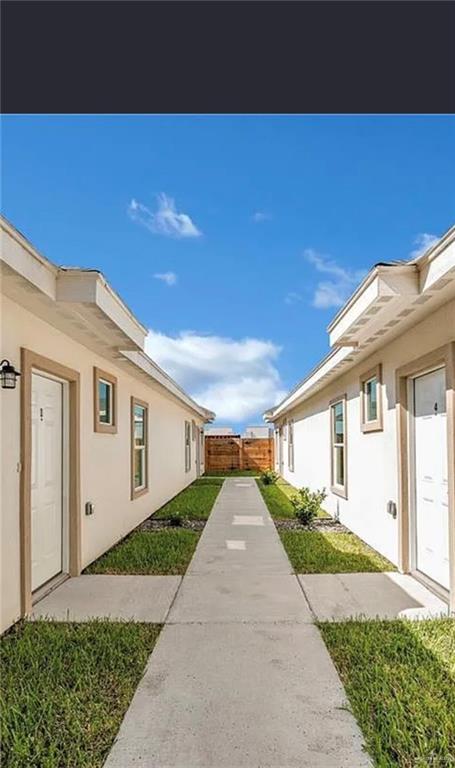 1303 Marcela Drive, Unit 4 Weslaco, TX 78599 - Photo 2 of 12 View of front yard