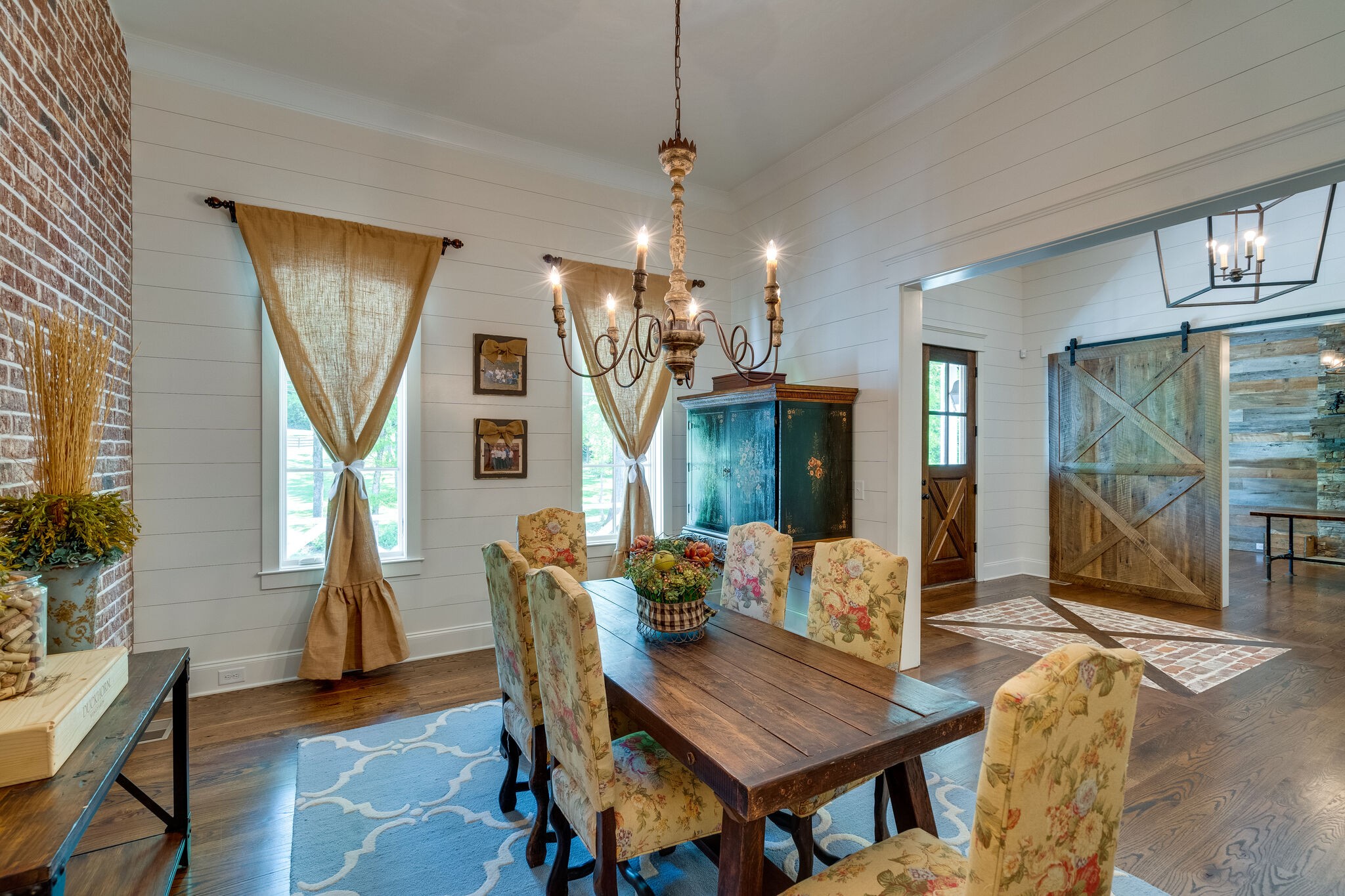 1453 Sneed Road West Franklin, TN 37069 - Photo 11 of 50 a view of a dining room with furniture window and wooden floor