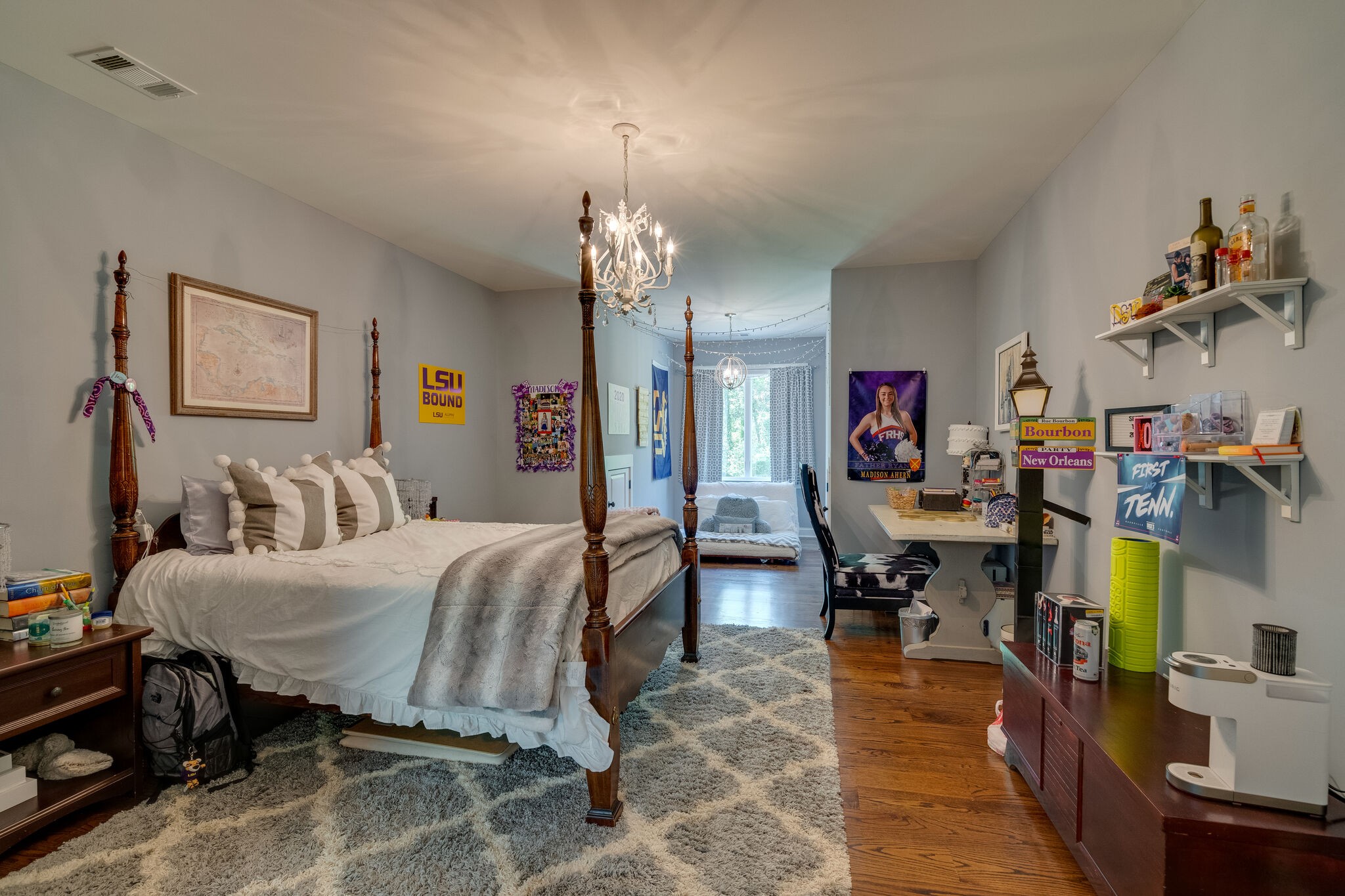 1453 Sneed Road West Franklin, TN 37069 - Photo 33 of 50 a bedroom with a bed a table and potted plants on the table