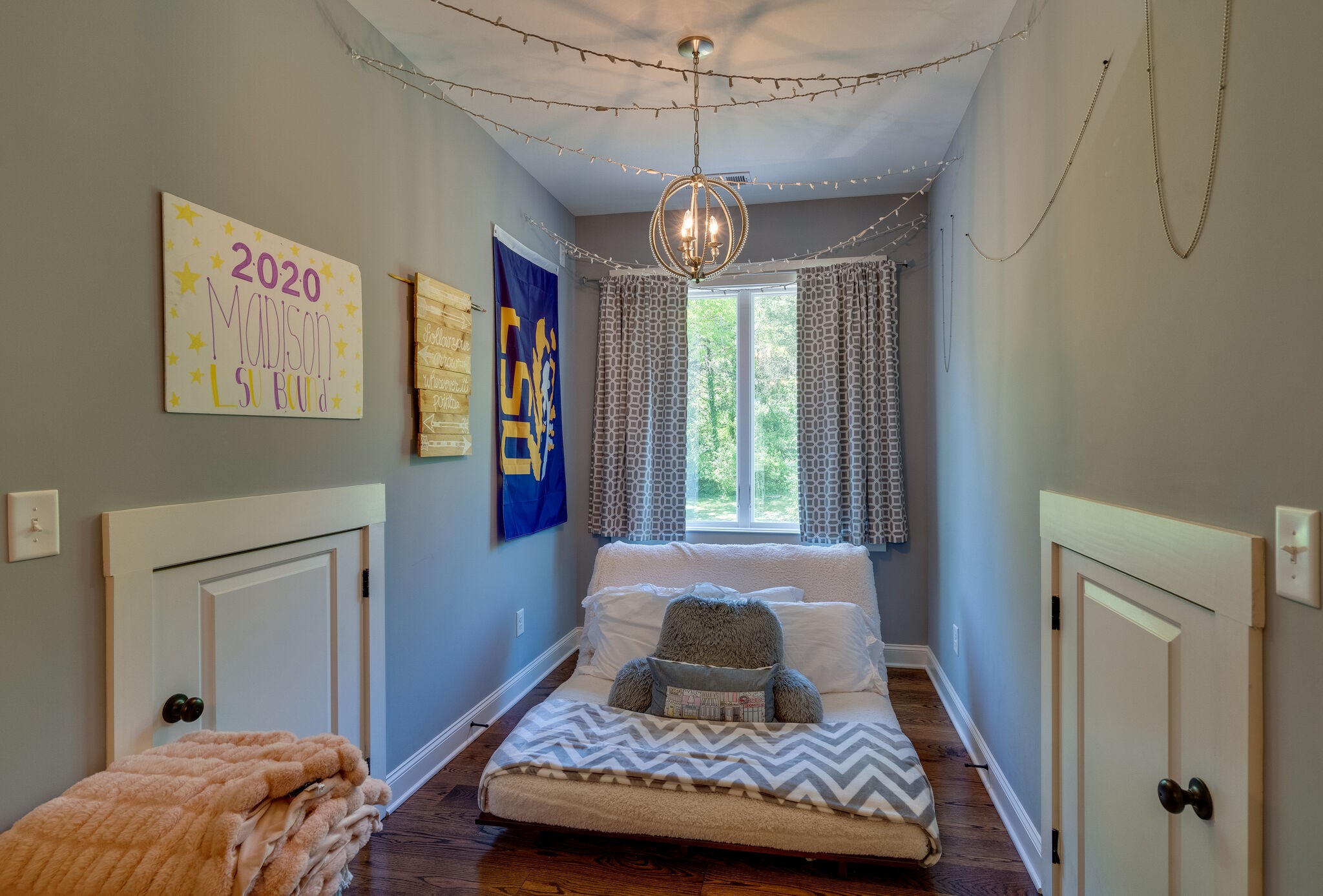 1453 Sneed Road West Franklin, TN 37069 - Photo 34 of 50 a bedroom with a bed and wooden floor