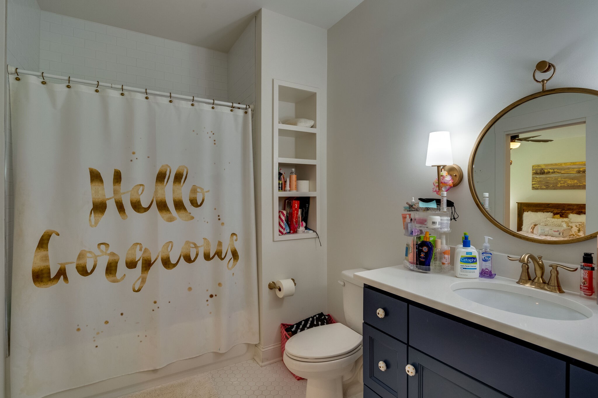1453 Sneed Road West Franklin, TN 37069 - Photo 39 of 50 a bathroom with a toilet sink and mirror