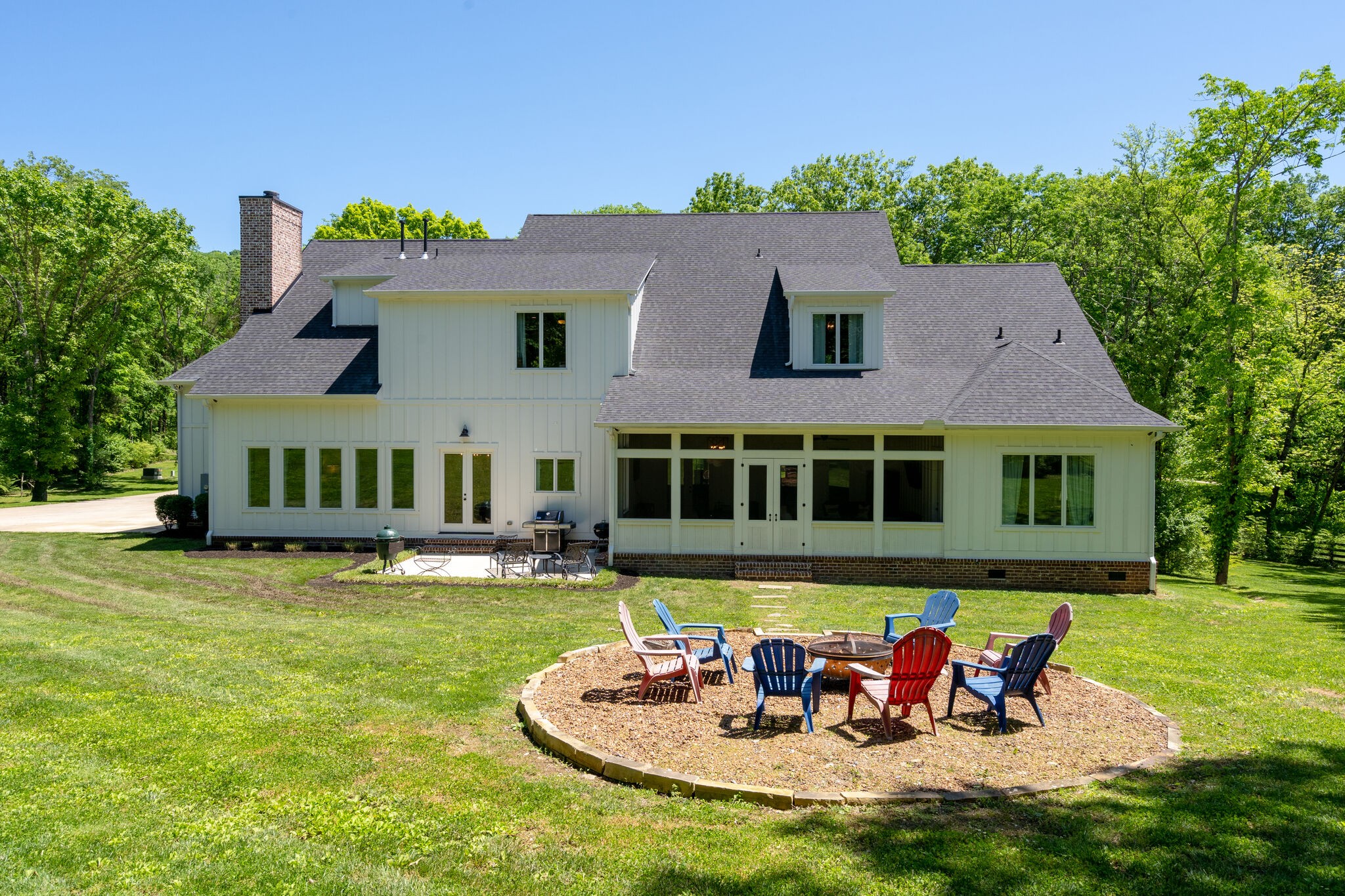 1453 Sneed Road West Franklin, TN 37069 - Photo 48 of 50 a view of a house with swimming pool and sitting area