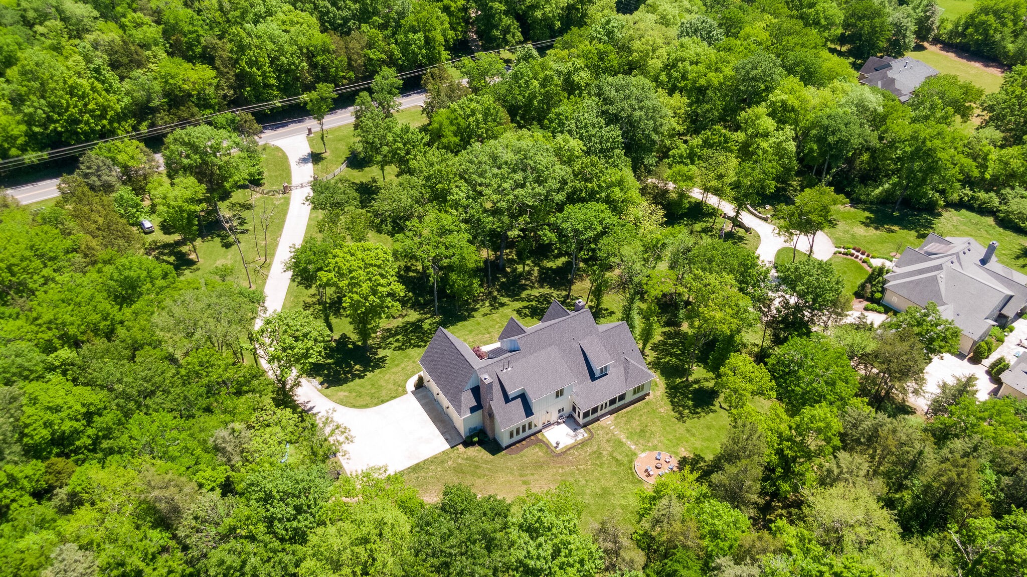 1453 Sneed Road West Franklin, TN 37069 - Photo 49 of 50 an aerial view of a house with a yard and garden