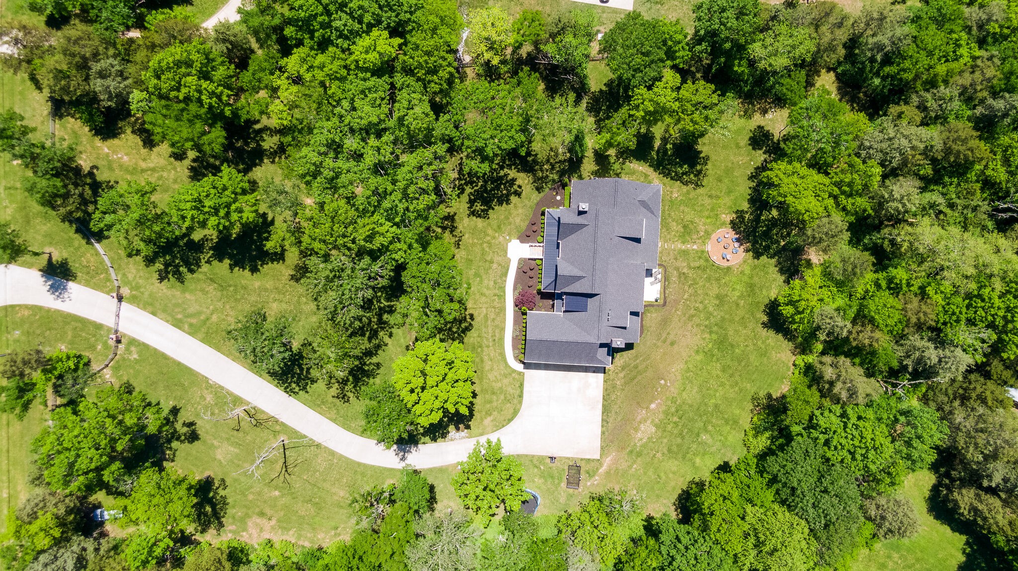 1453 Sneed Road West Franklin, TN 37069 - Photo 50 of 50 an aerial view of residential house with outdoor space and trees all around