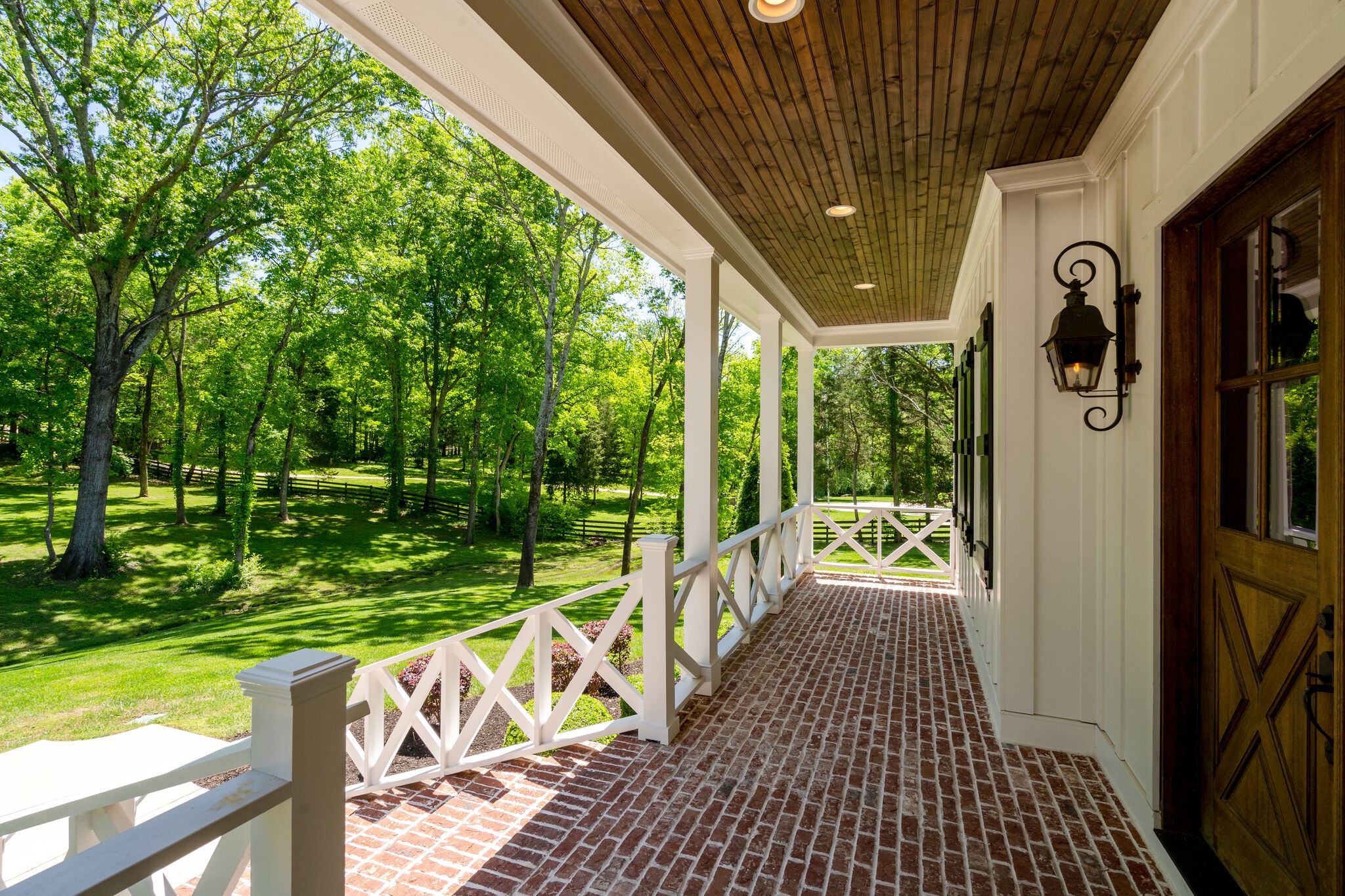 1453 Sneed Road West Franklin, TN 37069 - Photo 8 of 50 a view of a porch with wooden floor