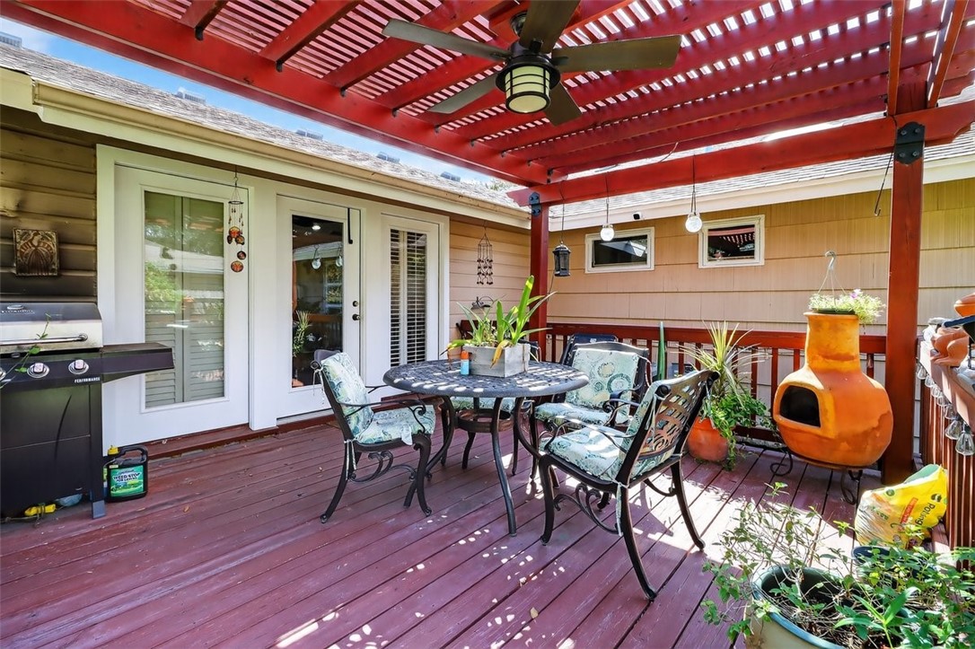 402 Pasadena Place Corpus Christi, TX 78411 - Photo 31 of 39 Shady deck area with fan