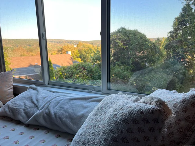 a view of a city from a balcony