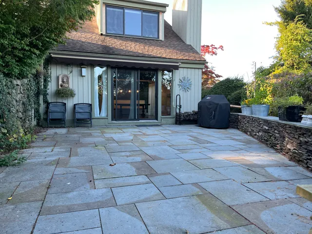 a view of a house with door open porch