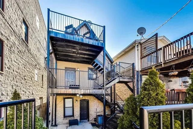 a view of a balcony with street view