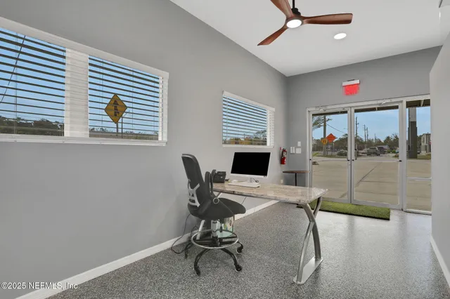 a view of a livingroom with furniture