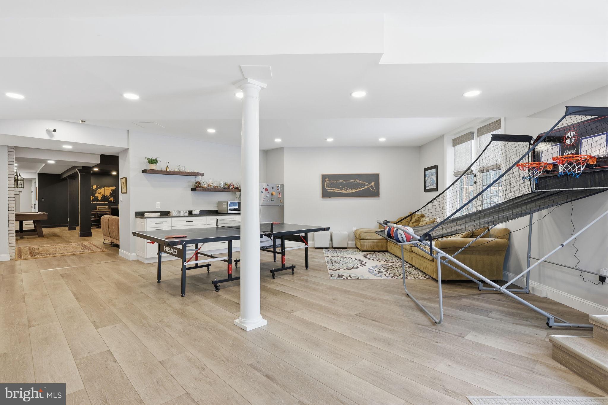 7 Woodland Road Newtown, PA 18940 - Photo 108 of 137 a living room with lots of furniture and a wooden floor