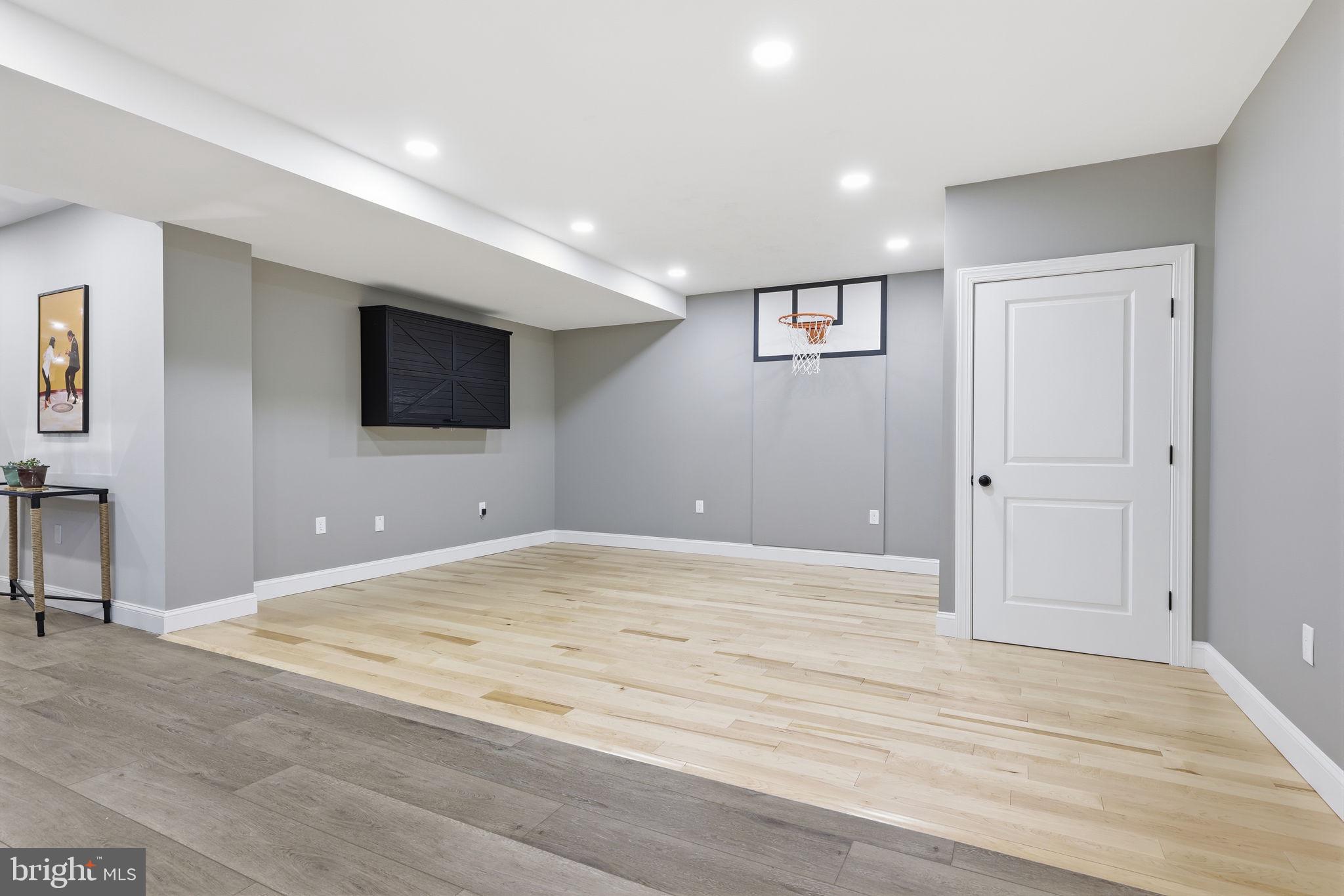 7 Woodland Road Newtown, PA 18940 - Photo 116 of 142 basketball area with professional maple flooring