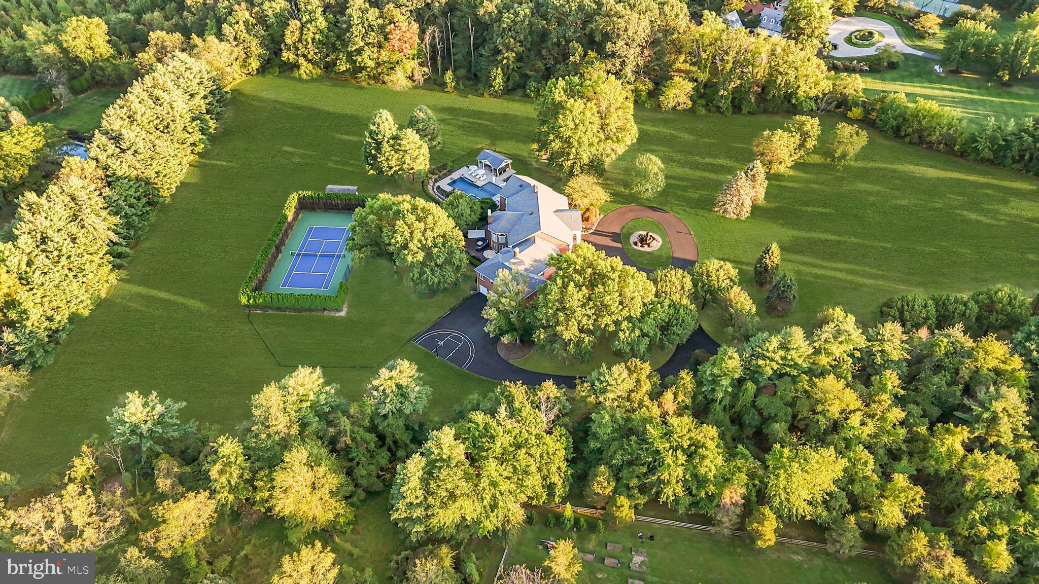 7 Woodland Road Newtown, PA 18940 - Photo 131 of 137 a view of a lake with a houses