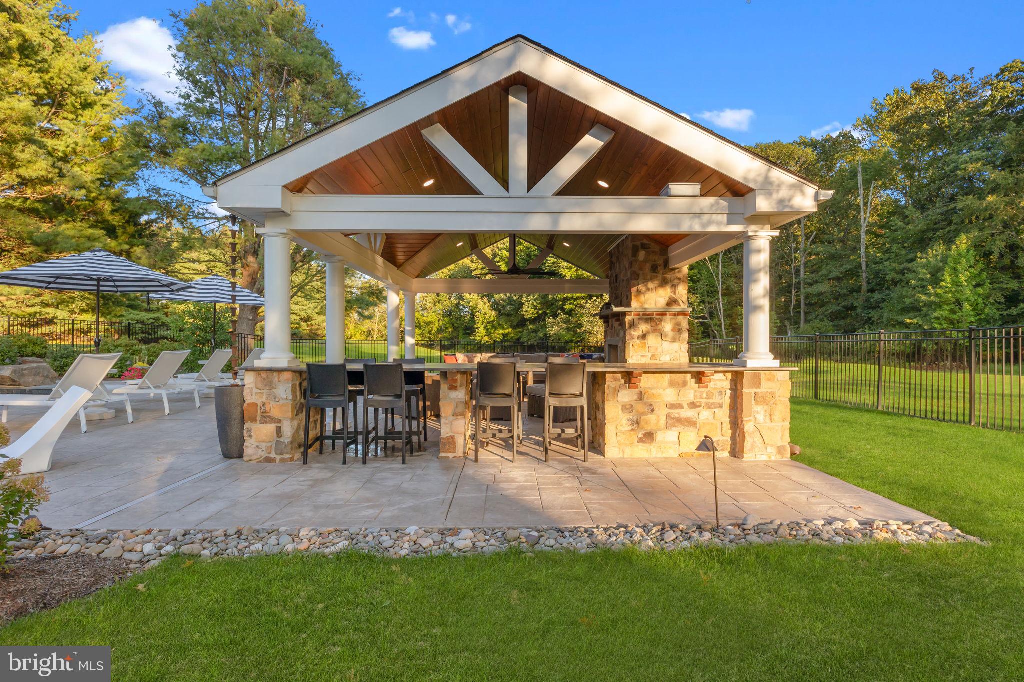 7 Woodland Road Newtown, PA 18940 - Photo 14 of 137 a front view of a house with garden