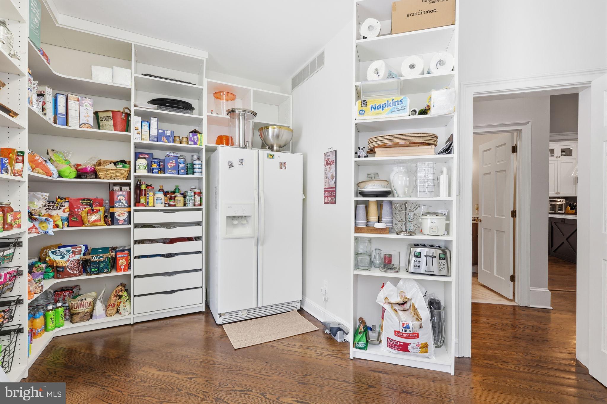 7 Woodland Road Newtown, PA 18940 - Photo 43 of 137 a room with a book shelf and a book shelf