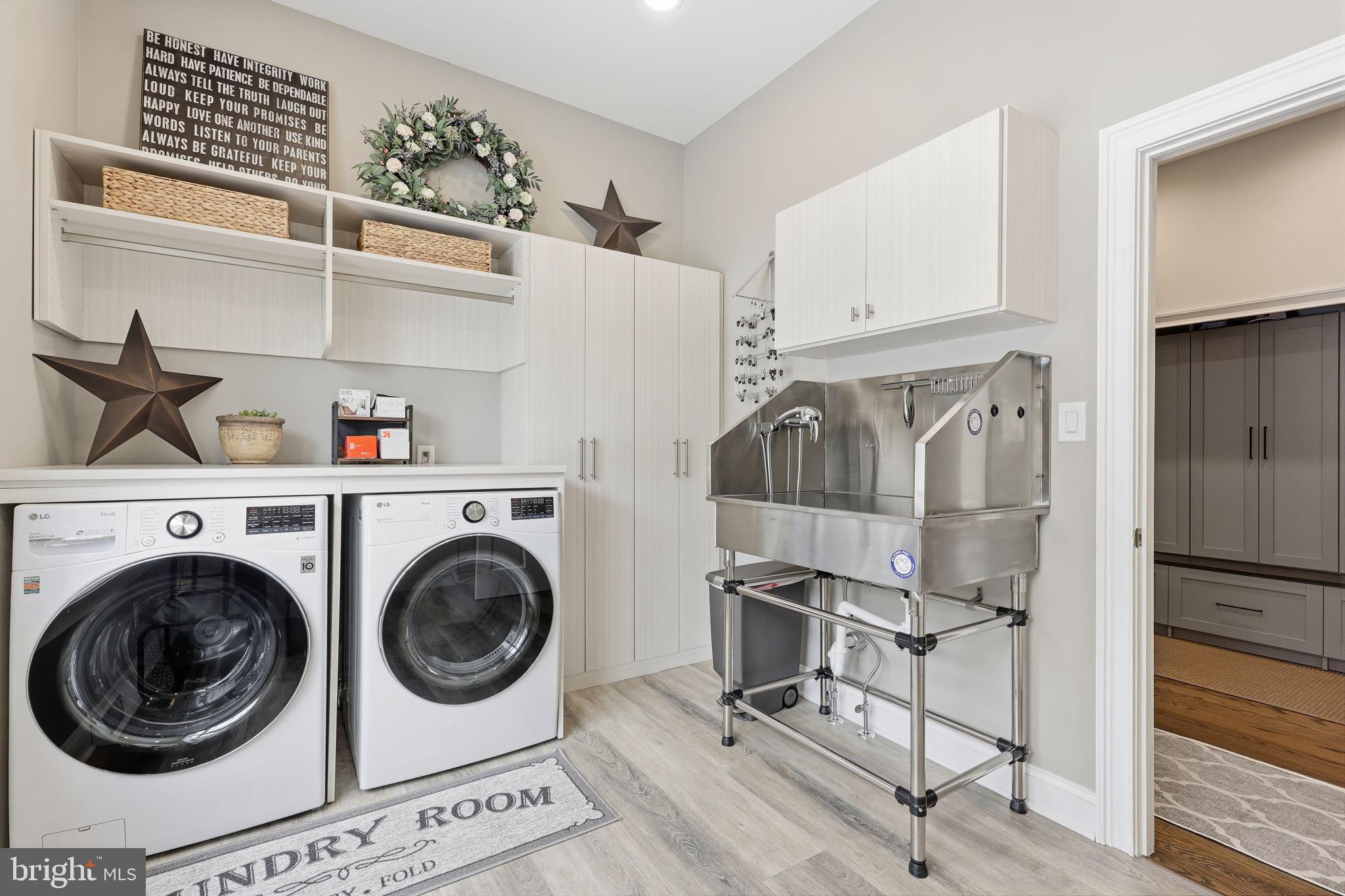 7 Woodland Road Newtown, PA 18940 - Photo 51 of 142 a view of a storage & utility room with washer and dryer