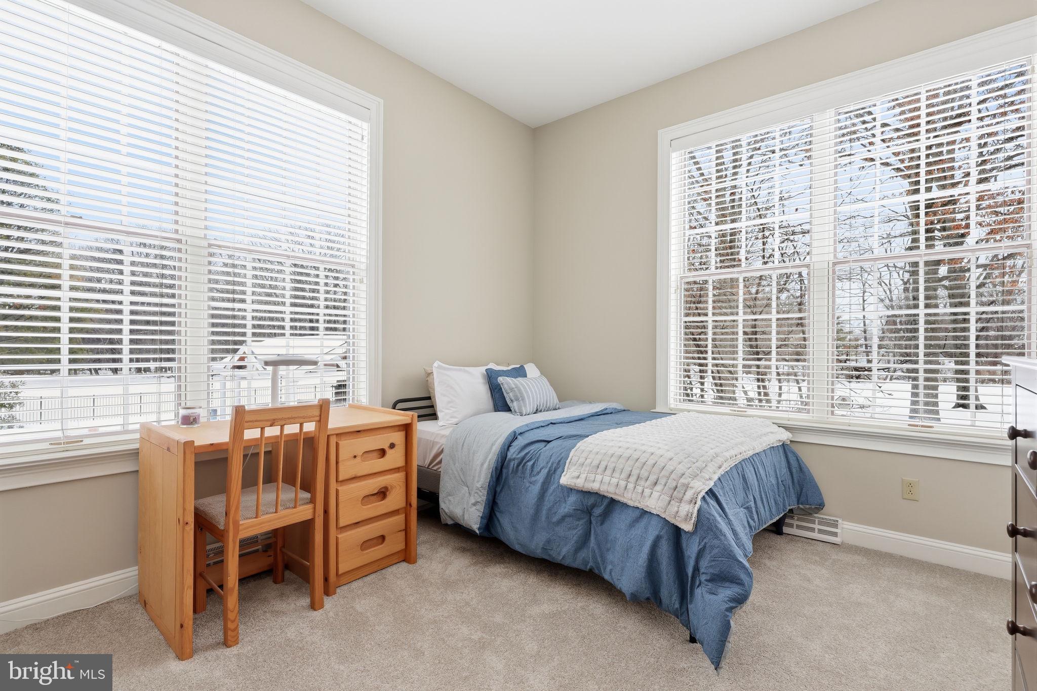 7 Woodland Road Newtown, PA 18940 - Photo 56 of 137 a bed room with a bed and a window
