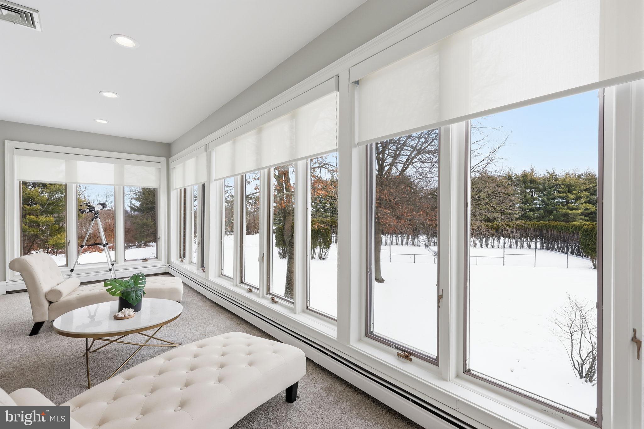 7 Woodland Road Newtown, PA 18940 - Photo 73 of 137 a living room with furniture and a floor to ceiling window