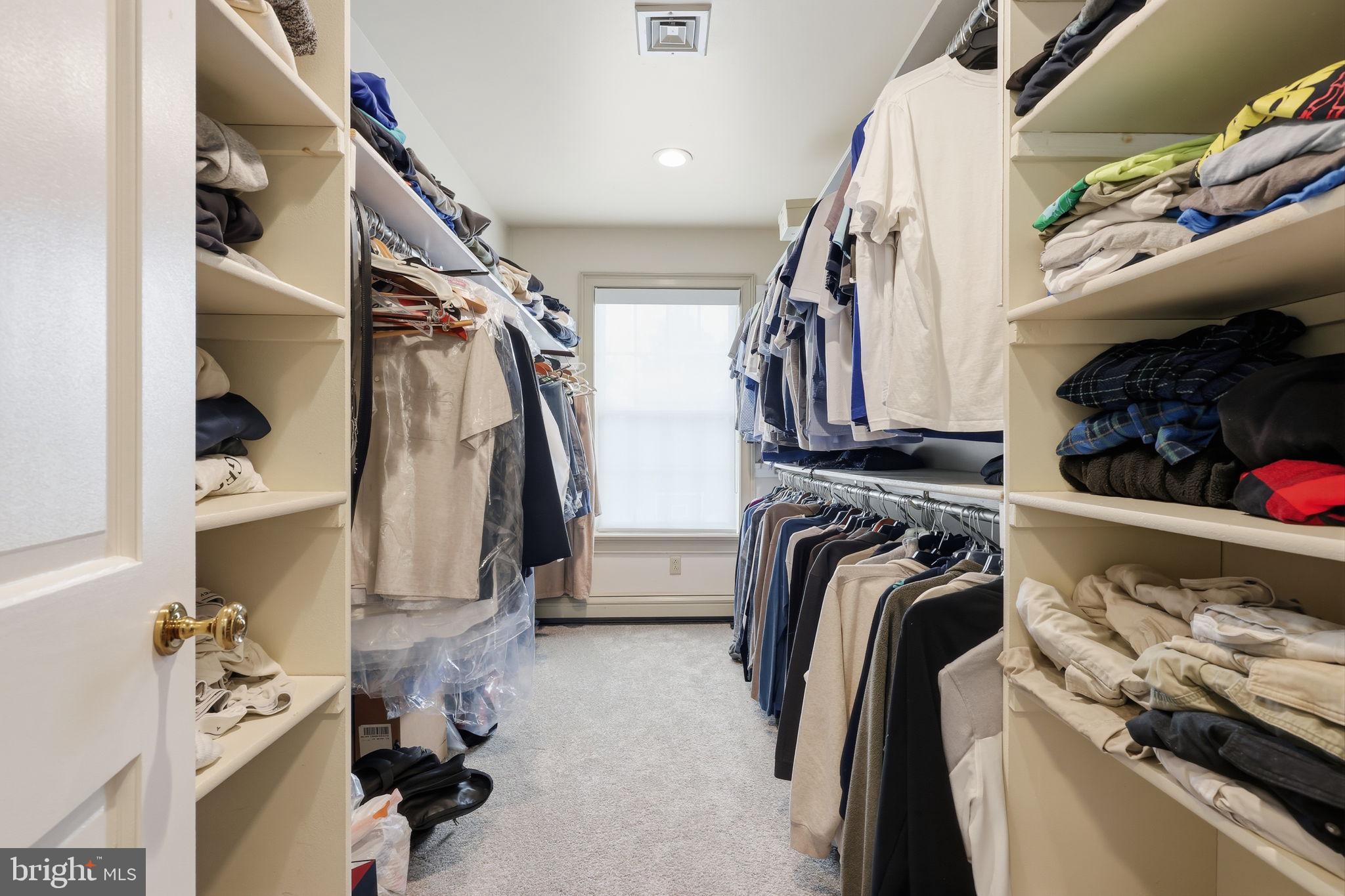 7 Woodland Road Newtown, PA 18940 - Photo 79 of 137 a view of walk in closet with clothes and shoes