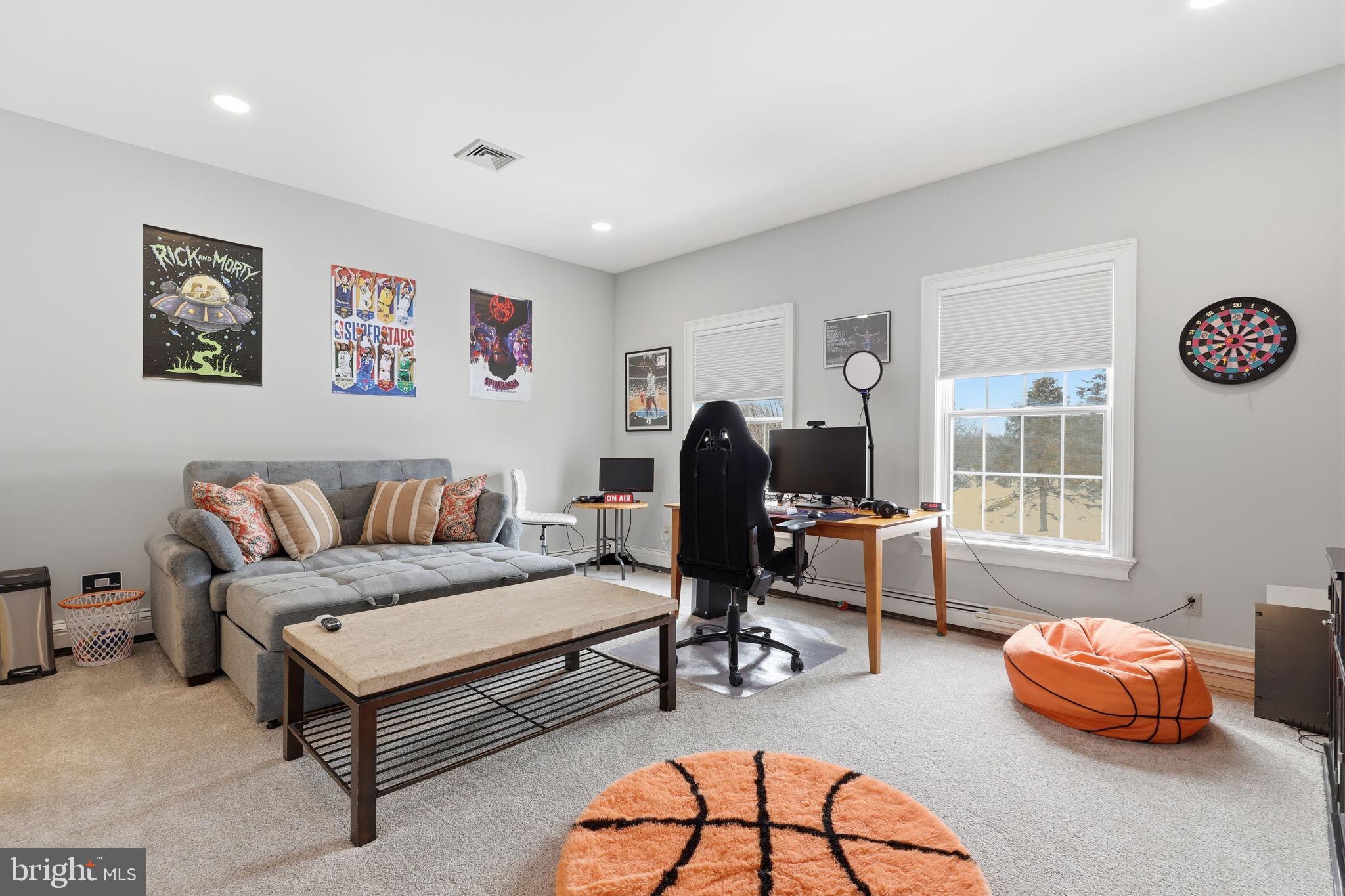 7 Woodland Road Newtown, PA 18940 - Photo 87 of 137 a living room with furniture a rug and a window