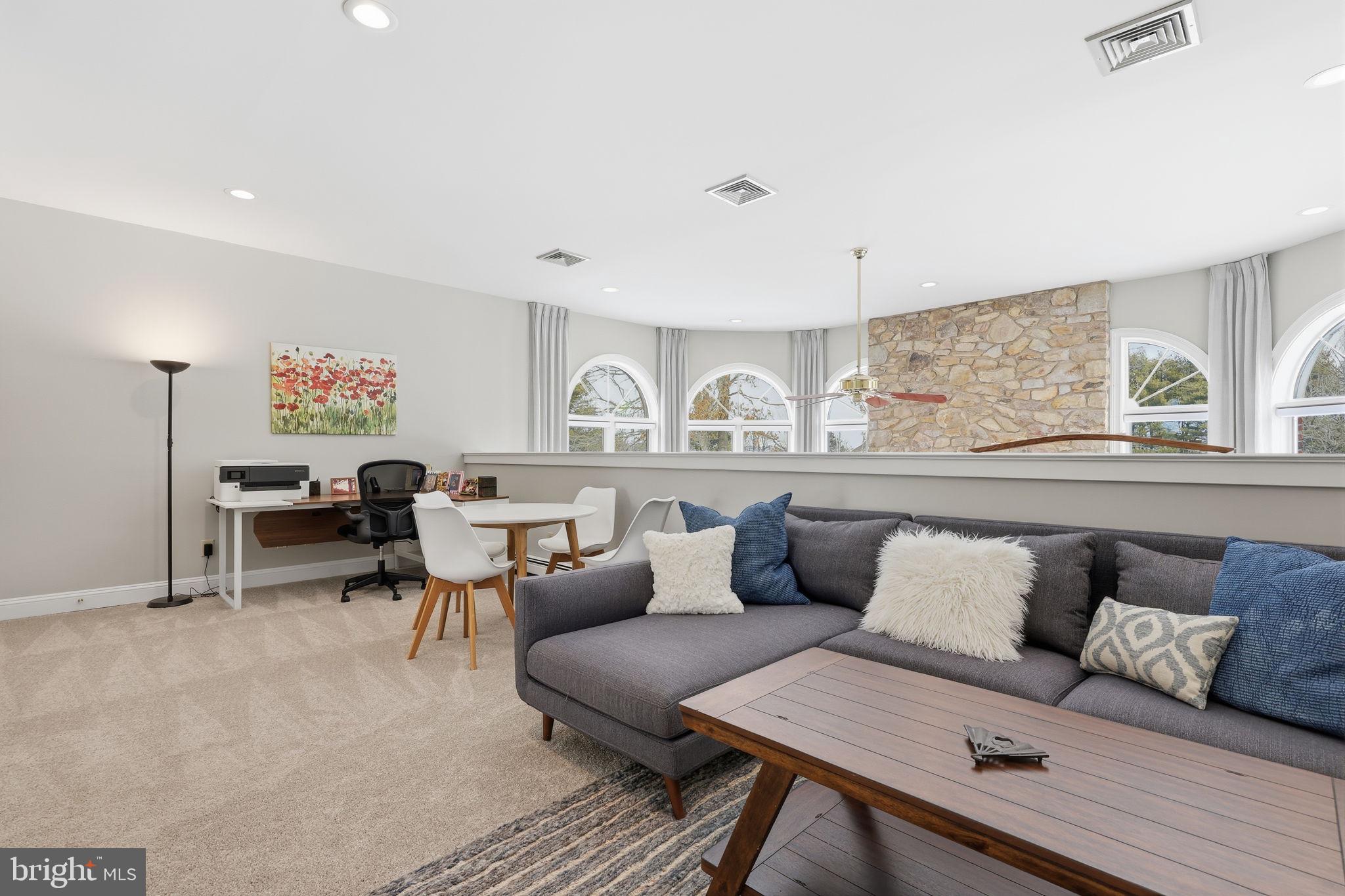 7 Woodland Road Newtown, PA 18940 - Photo 90 of 137 a living room with furniture and a large window