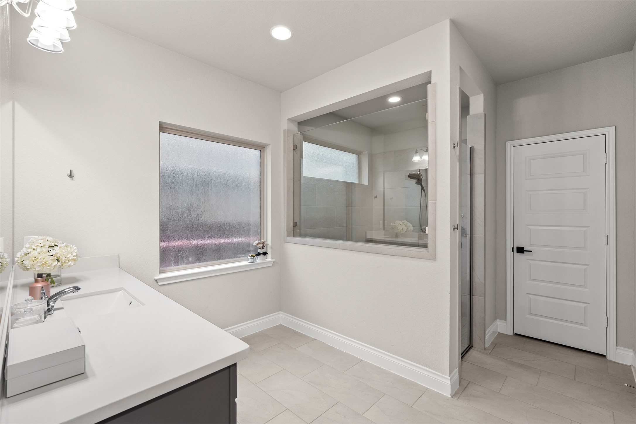 341 Pisa Lane Georgetown, TX 78628 - Photo 22 of 31 a bathroom with a sink and a mirror