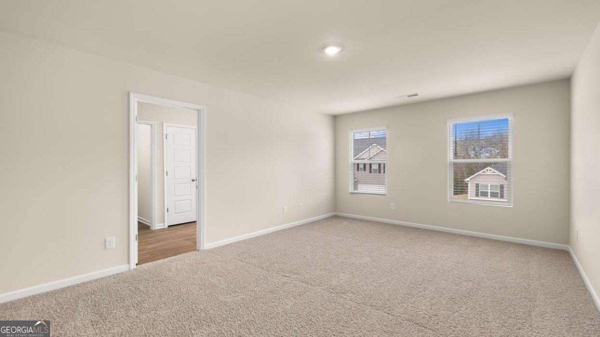 208 Cattle Drive Perry, GA 31069 - Photo 15 of 37 a view of an empty room with a window