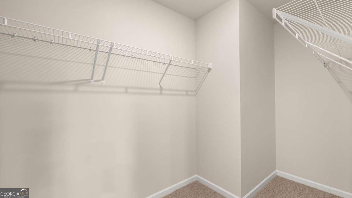 208 Cattle Drive Perry, GA 31069 - Photo 28 of 37 a view of a room with racks on the wall