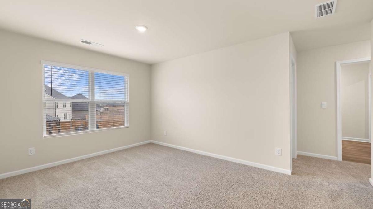 208 Cattle Drive Perry, GA 31069 - Photo 31 of 37 an empty room with a window