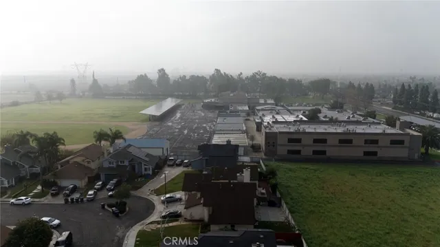 a white refrigerator freezer sitting next to a window