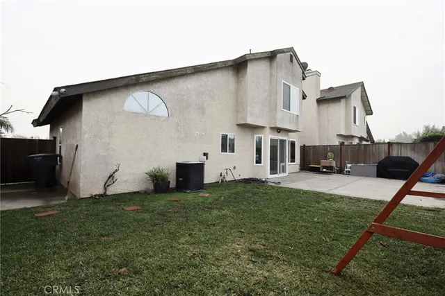 a house view with a garden space