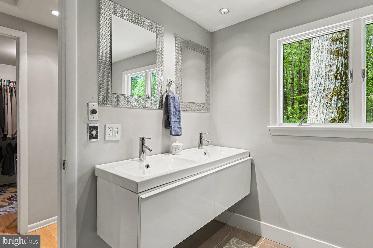 13 High Road New Hope, PA 18938 - Photo 29 of 56 a bathroom with a sink and a mirror