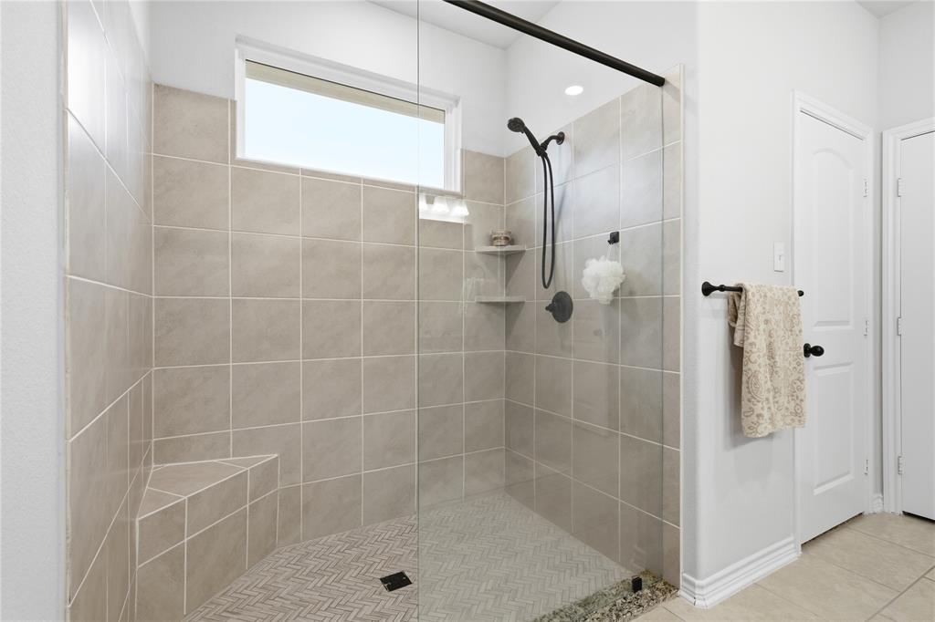 1292 Whiskey Hollow Road West, TX 76691 - Photo 18 of 34 Full bath featuring a stall shower and tile patterned floors