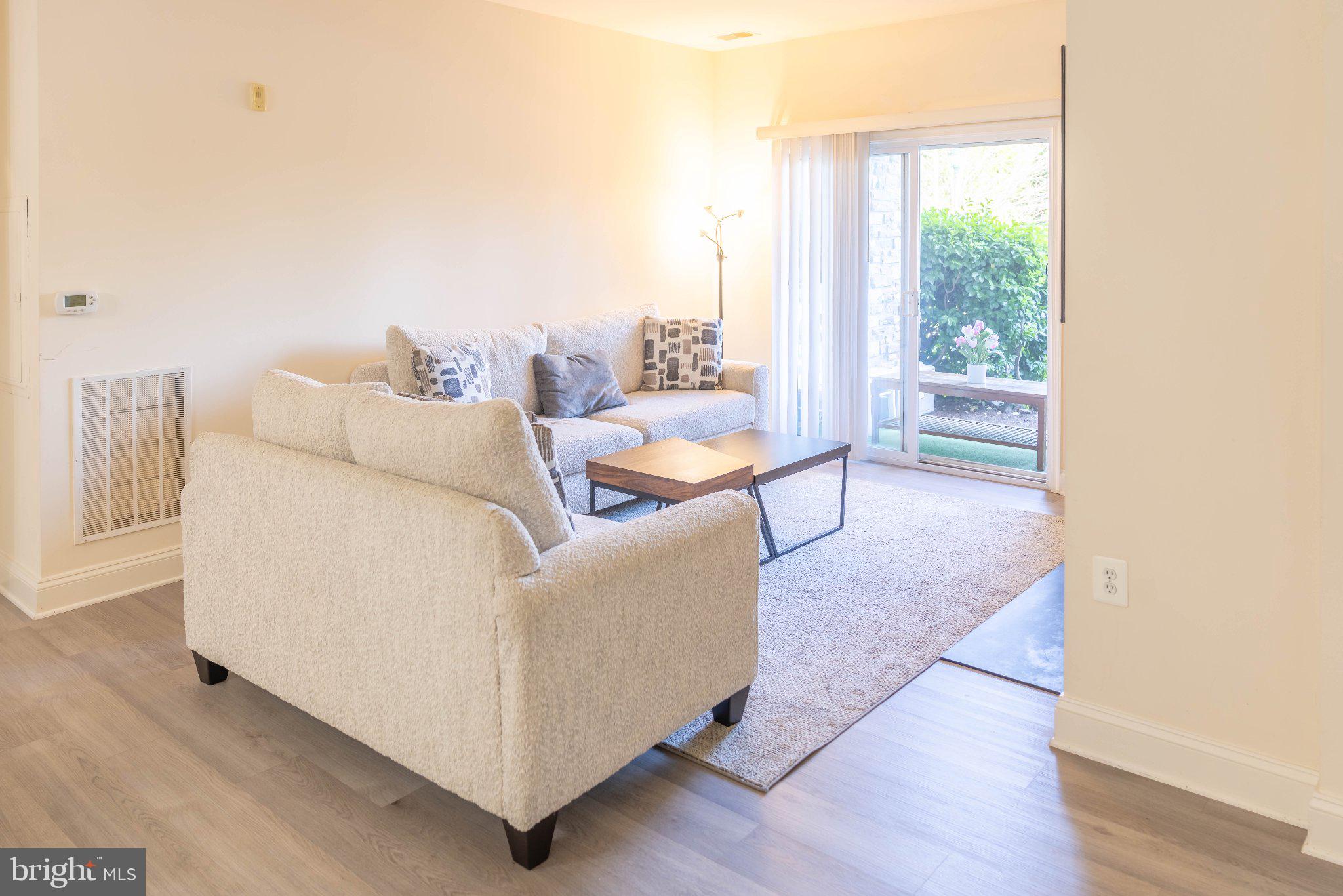 12824 Clarksburg Square Road, Unit 105 Clarksburg, MD 20871 - Photo 18 of 96 Bright and inviting living space.