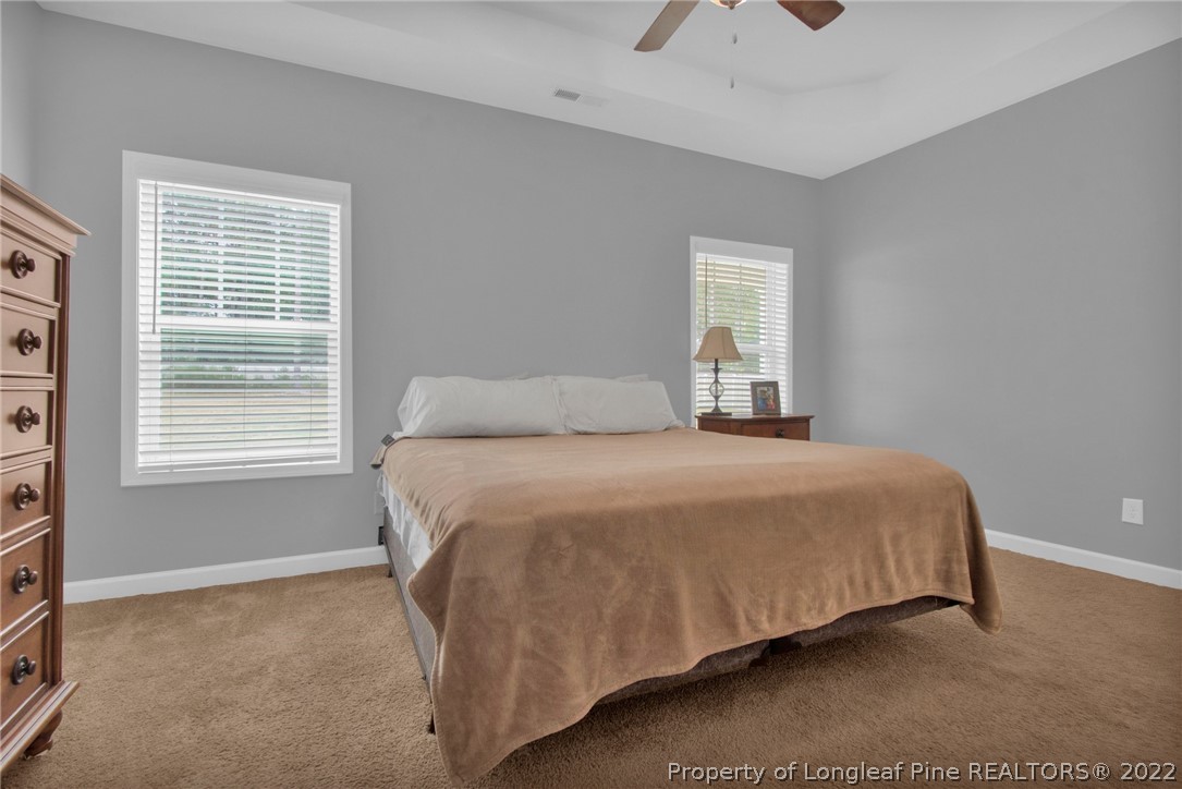 809 Montrose Road Raeford, NC 28376 - Photo 13 of 33 a bedroom with a bed and a window