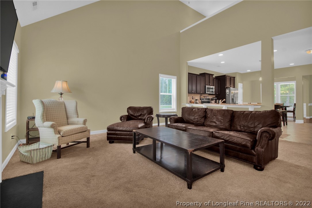809 Montrose Road Raeford, NC 28376 - Photo 3 of 33 a living room with furniture and a wooden floor