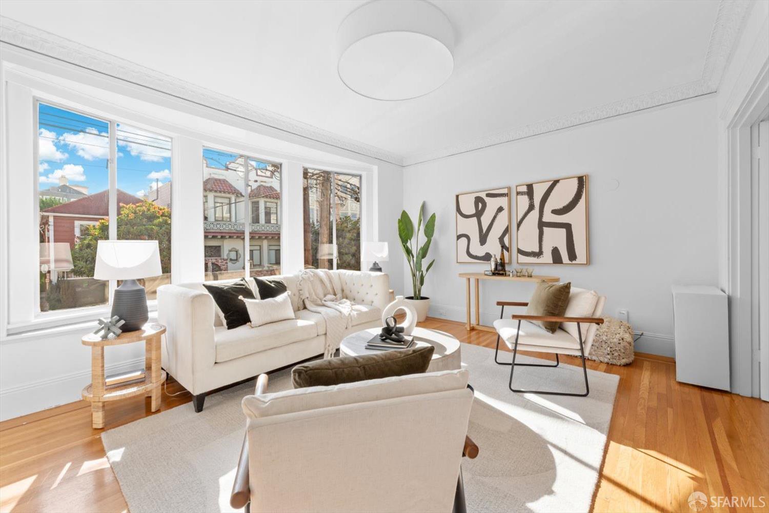 1624 Filbert Street, Unit 1 San Francisco, CA 94123 - Photo 20 of 47 a living room with furniture and a table