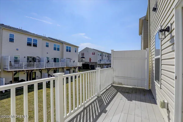 a view of a bathroom with a sink and a mirror