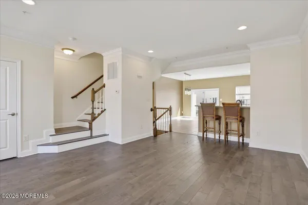 a view of a livingroom with furniture and wooden floor